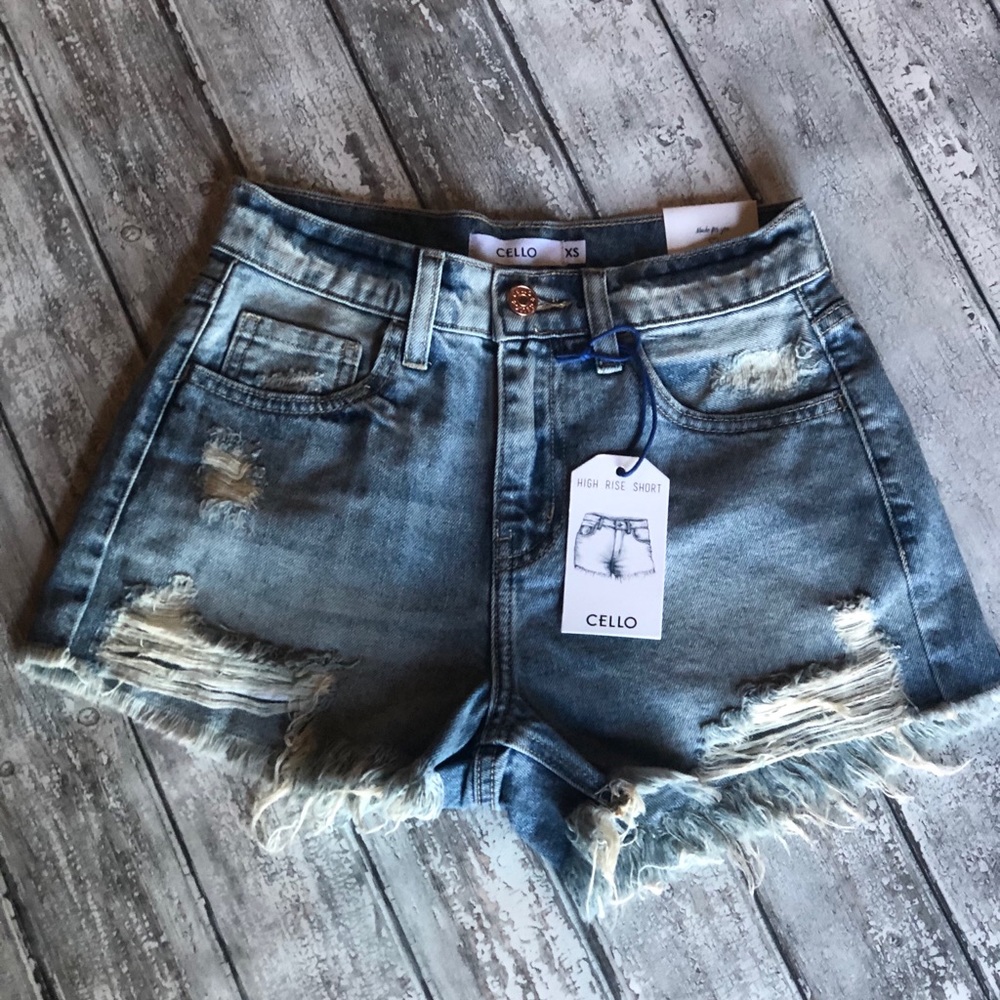 Light Wash High Rise Distressed Denim Shorts